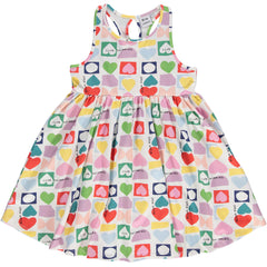 The Hearts Iggy Dress from Beau Loves. This easy to throw on dress in our cut-out hearts print is made from organic fabric.
