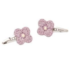 The Baby Fleur Set from Misha & Puff. A two-color hand-crocheted flower set on snap clips