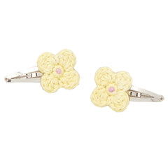 The Baby Fleur Set from Misha &amp; Puff. A two-color hand-crocheted flower set on snap clips