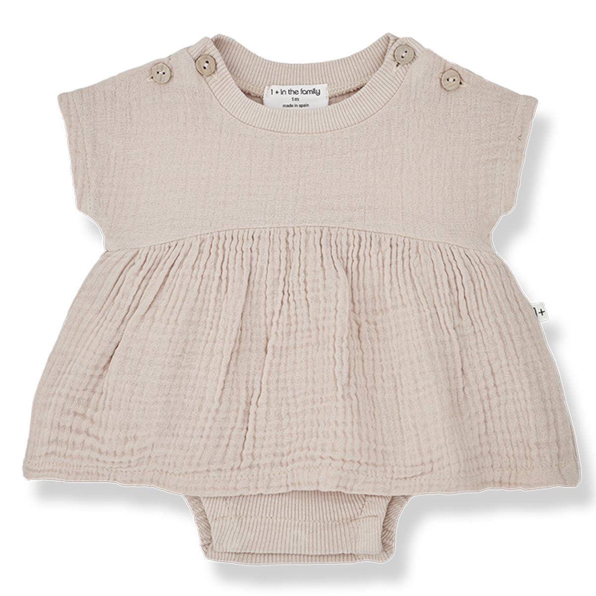 The Candela Body Dress from 1 + in the Family. Sweet baby romper dress in a cotton muslin fabric