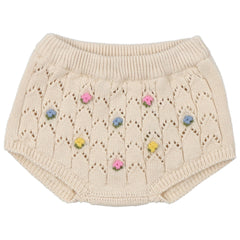 Canea Baby Bloomer from The New Society. Knit bloomer with structure and flower details. It has ribbed waistband and cuffs.