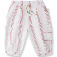 The Capras Pants from 1+ in the Family with strawberry stripes, elastic waistband, braided drawstring, and side pocket.