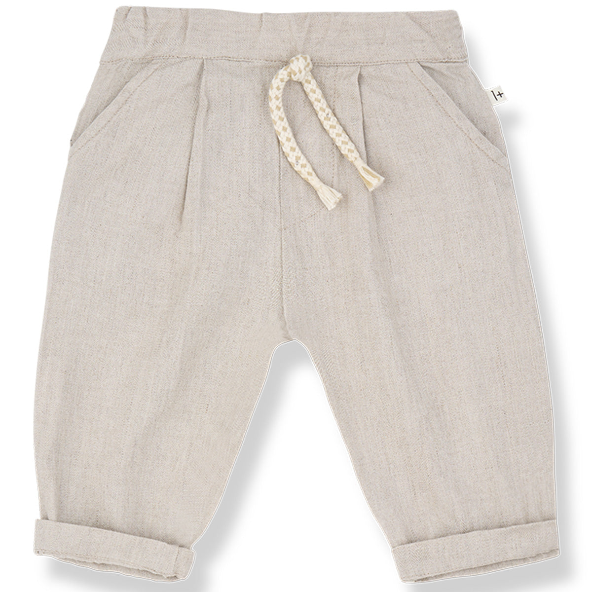 The Castell Pants from 1+ in the Family in beige with elastic waistband, braided drawstring, front pockets, and rolled cuffs.
