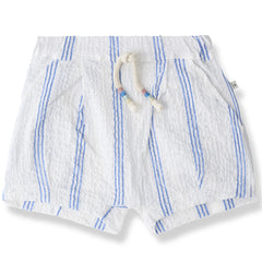 The Conca Bermuda from 1+ in the Family with ultramarine stripes, elastic waistband, and braided drawstring.