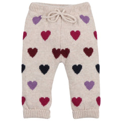 The Cora Baby Pant from The New Society. Knitted pants with multicolor heart pattern and drawstrings.