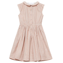 Ines Dress from C'era Una Volta with a delicate floral print, Peter Pan collar, and button-down front.