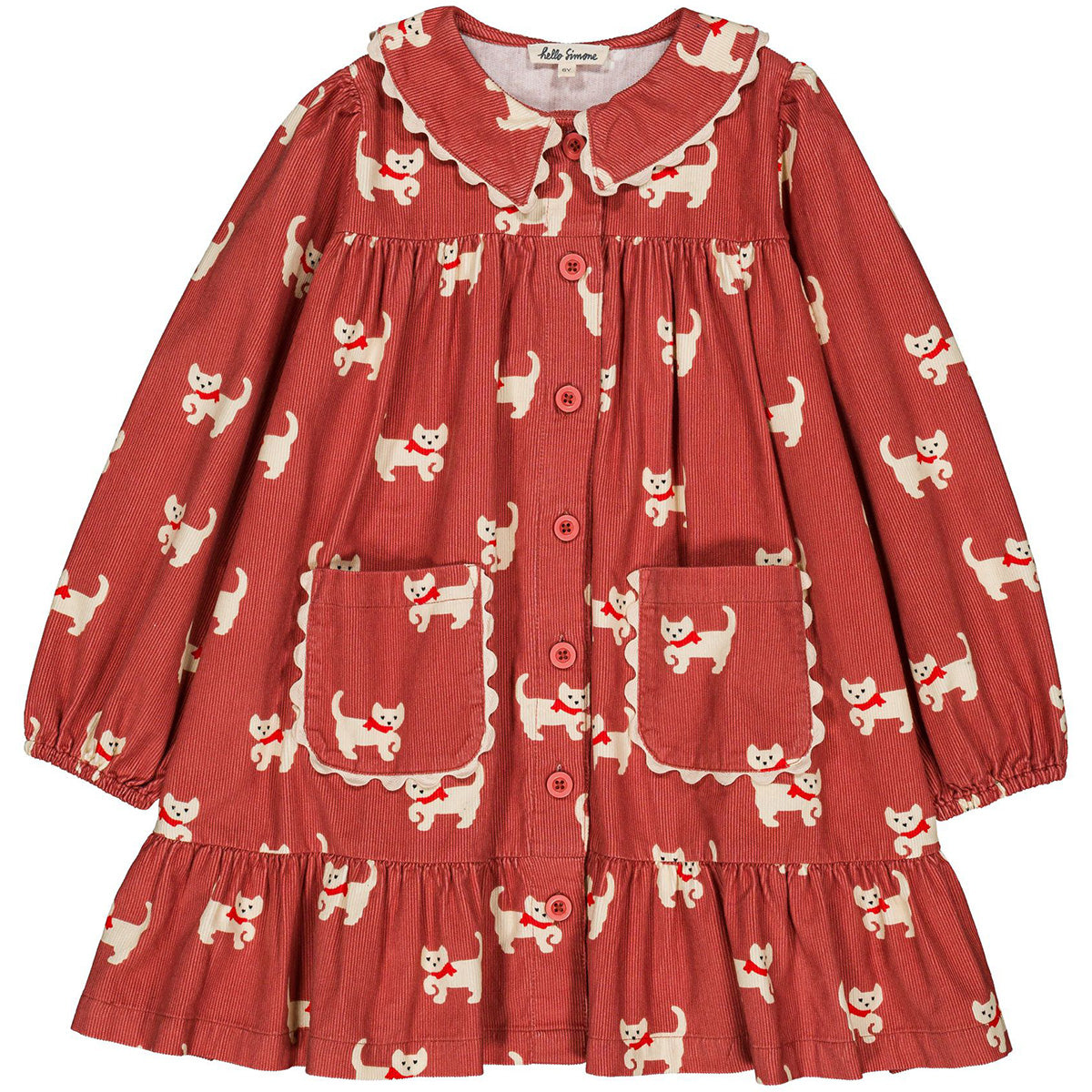 The Charlie Dress from Hello Simone with a cat print, flounced collar, balloon sleeves, and front patch pocket.