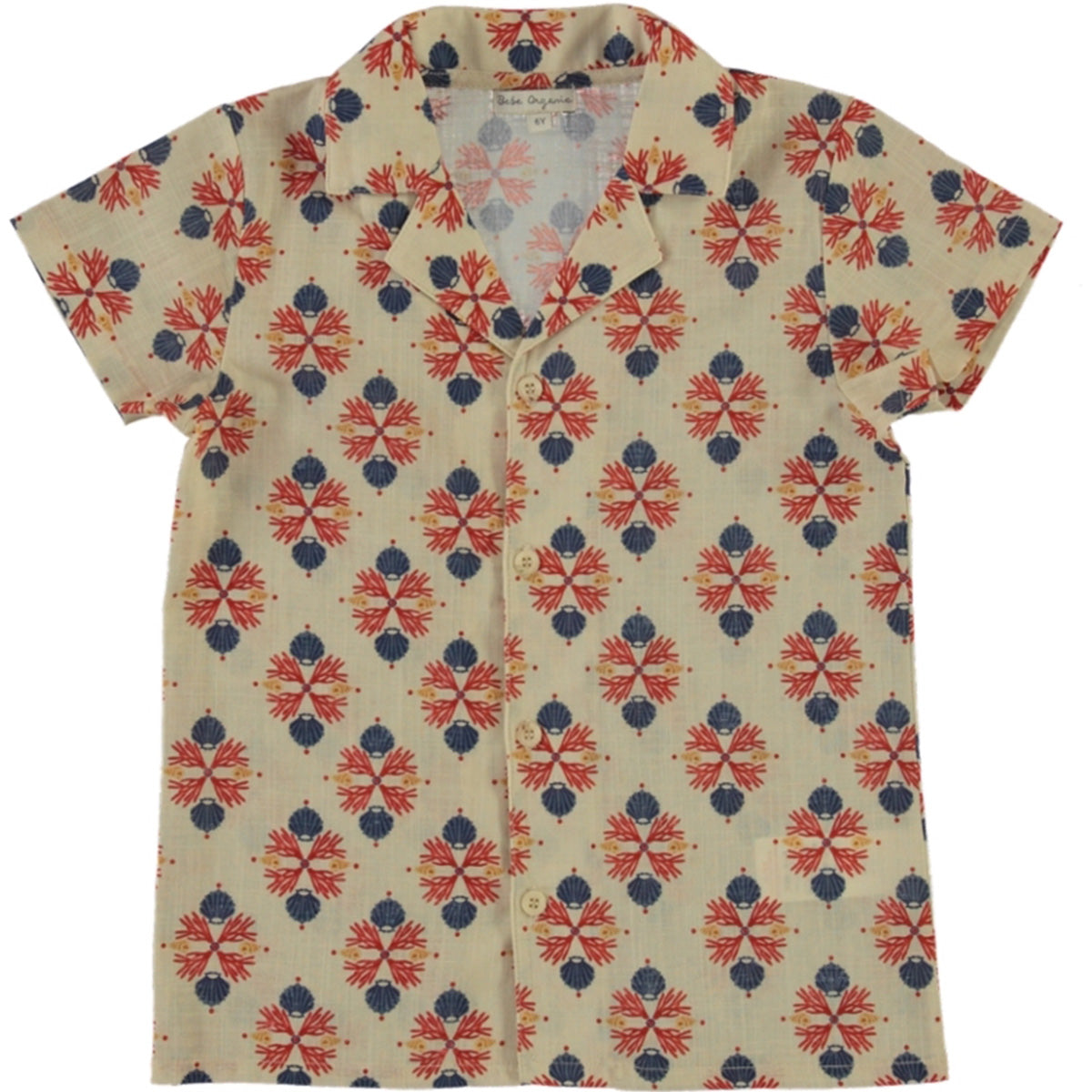 The Coast Shirt by Bebe Organic, cream short-sleeve kids shirt with coral and shell print, camp collar, and button front.