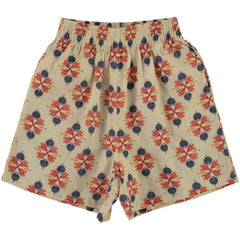 The Coast Shorts by Bebe Organic, cream kids shorts with coral and shell print, elastic waistband, and relaxed fit.