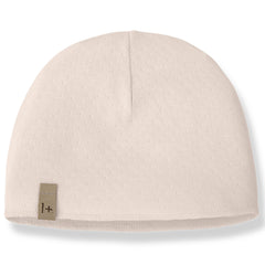 The Elise Beanie from 1+ in the Family, a soft baby hat with a lightweight textured fabric and snug fit.