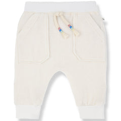 The Farrutx Pants from 1+ in the Family in soft terry fabric with an elastic waist, drawstring, and front patch pockets.