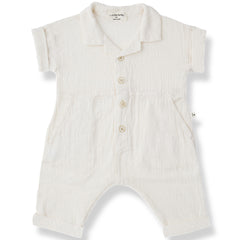 The Fonteta Overall from 1+ in the Family in off-white with collar, front buttons, rolled sleeves, and side pockets.