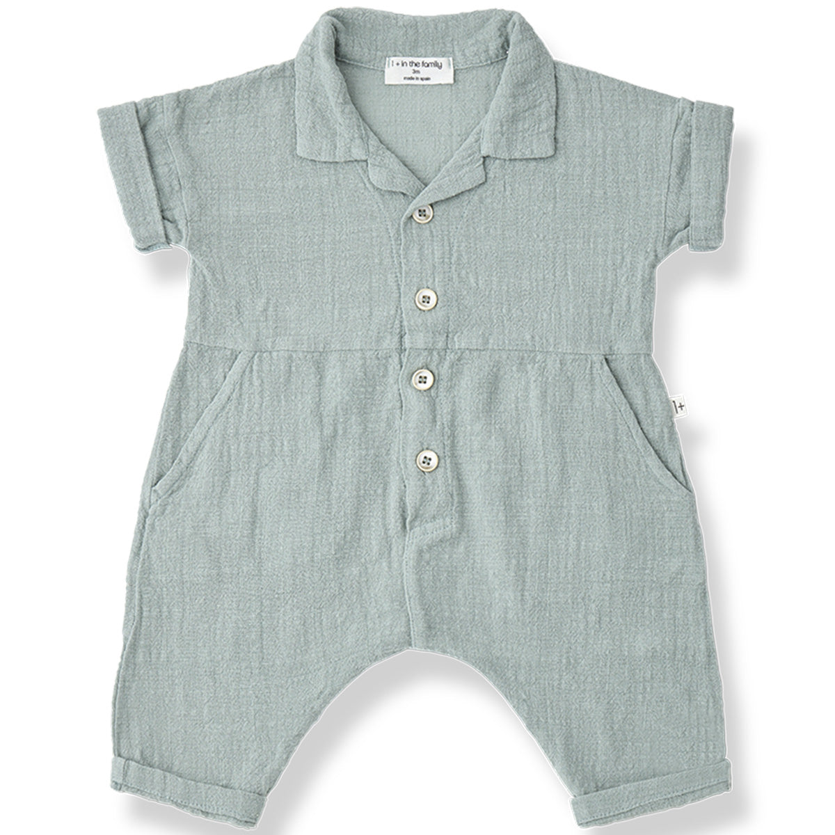 The Fonteta Overall from 1+ in the Family in iceberg blue with collar, front buttons, rolled sleeves, and side pockets.