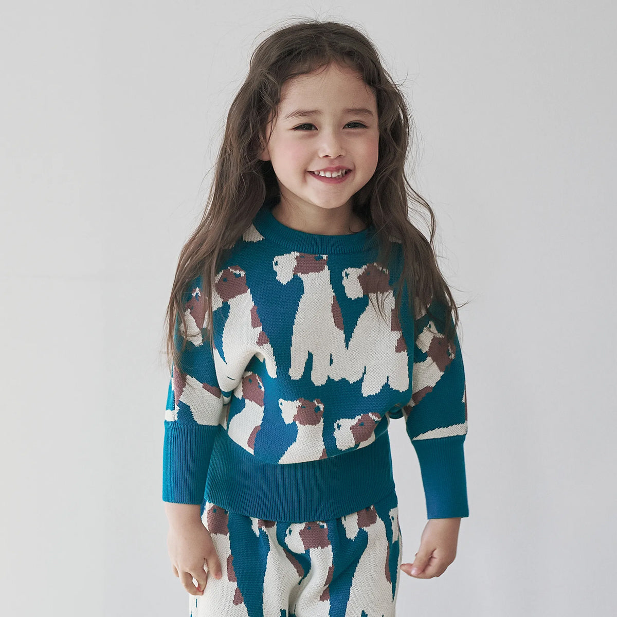 Momohanipopo Fox Terrior Knit Top, kids' sweater with an all-over fox terrier print, long sleeves and ribbed trims.
