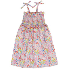Greneva Dress by The New Society. Featuring adjustable bow straps, smocking , and a ruffle finished with embroidery.