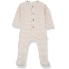 The Guim Jumpsuit from 1+ in the Family. A cozy, long-sleeved footed romper with a gingham pattern. Features a button-up front.