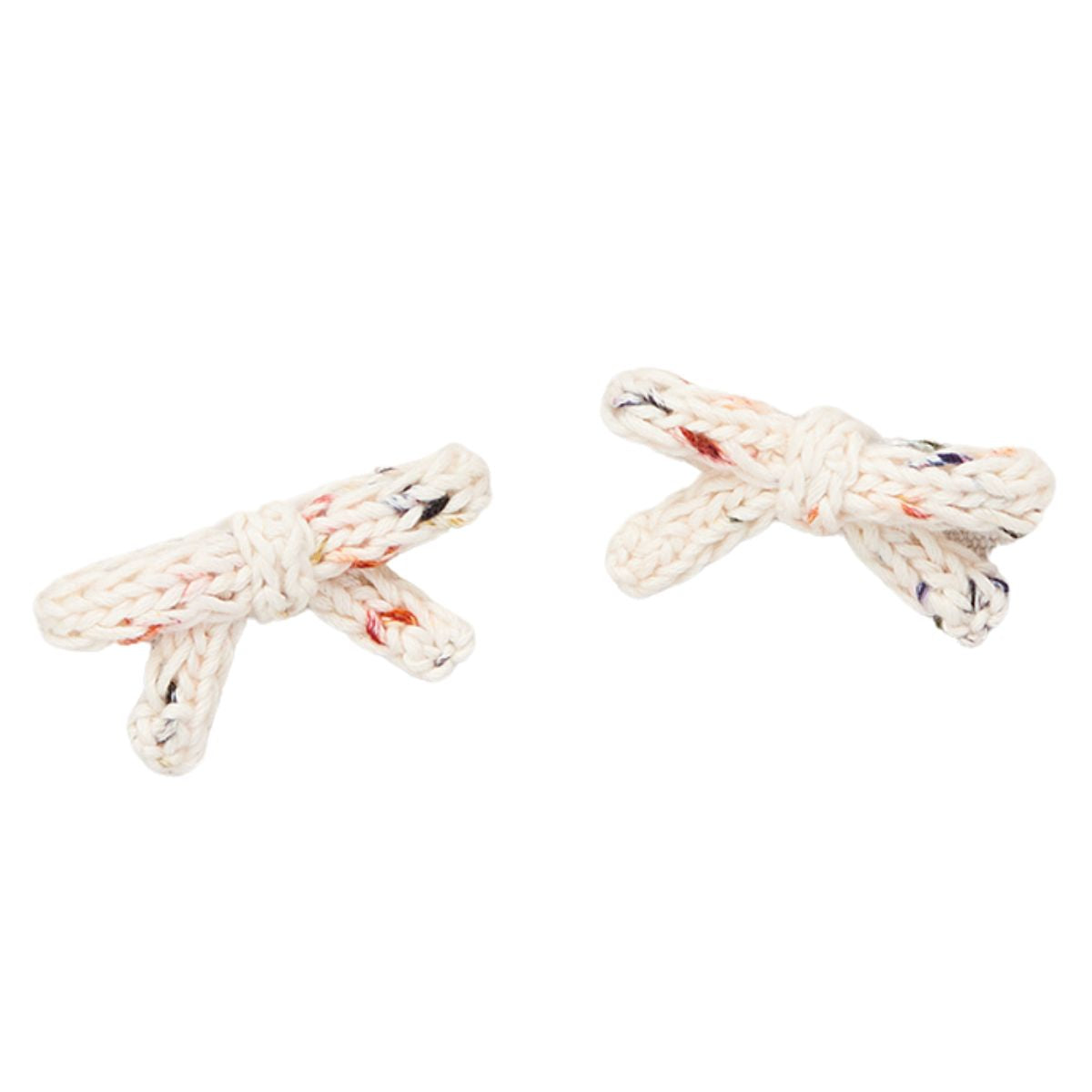The Goldie Bow Set from Misha & Puff. A set of hand-knit slim bows on alligator clips in Merino wool.