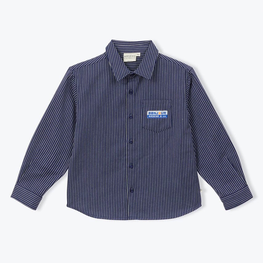 The navy Striped Shirt from Arsene et Les Pipelettes features a shirt collar, long sleeves with ribbed cuffs, fully buttoned front opening, a patch pocket at the chest with the signature "AP &amp; Co" badge, and a small flag label inserted in the side seam.