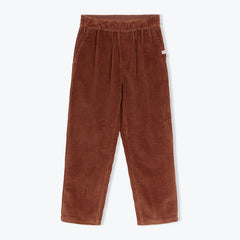 The Velvet Pants from Arsene et Les Pipelettes are GOTS-certified organic cotton corduroy pants with a regular fit, elasticated waistband, internal drawstring, side slit pockets, and back patch pockets with an AP badge.