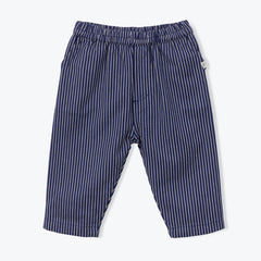 The navy blue Striped Baby Pants from Arsene et Les Pipelettes have an elasticated waist, inset pockets at the side seams, patch pockets at the back with a "Bonjour Arsène &amp; CO" badge on the right pocket, and a small flag label inserted on the front pocket.