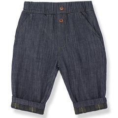 The Huron Pants from 1+ in the Family in dark denim with an elastic waist and plaid-lined cuffs.