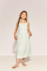 The In Simple English Dress by The Middle Daughter in mint green with delicate straps and gathered waist.