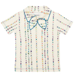 The Junior Scout Tee from Misha & Puff. A short-sleeved tee in Pima cotton, featuring the Scout pull-through kerchief.