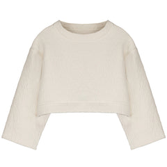 The Dune Sweatshirt from Little Creative Factory. This is a cream-colored long-sleeve top with a textured fabric.