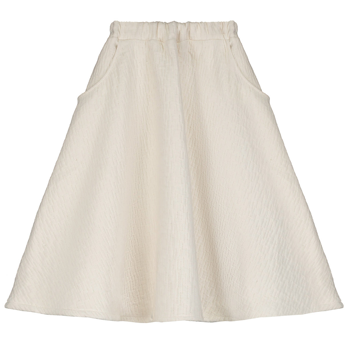 The Dune Circle Skirt from Little Creative Factory. This cream-colored skirt has a flared silhouette with side pockets.