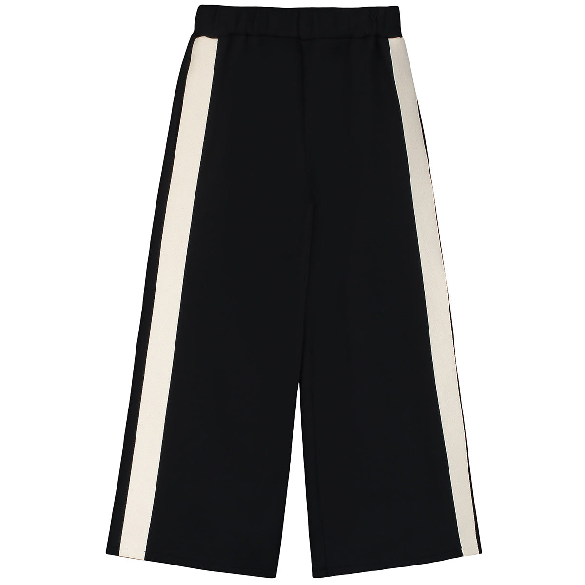 The Neoprene Pants from Little Creative Factory. Black wide-leg pants with cream-colored side stripes.