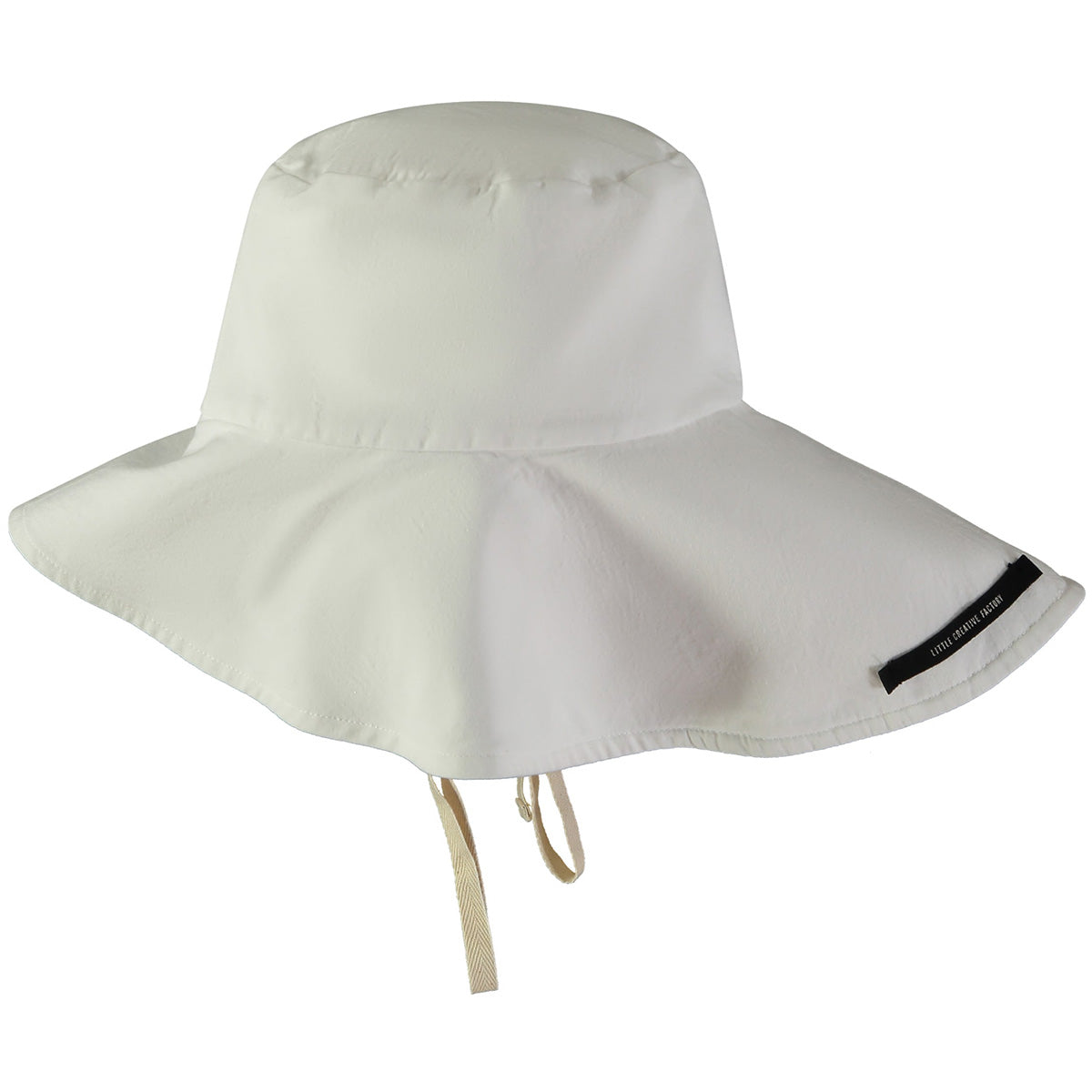 The Origami Hat from Little Creative Factory. Soft cotton hat in pristine white. Oversize brim and ribbon knot.