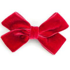 The Knot Pin from Hello Simone featuring a velvet bow with a hair pin for easy styling.