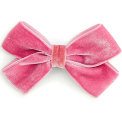 The Knot Pin from Hello Simone featuring a velvet bow with a hair pin for easy styling.