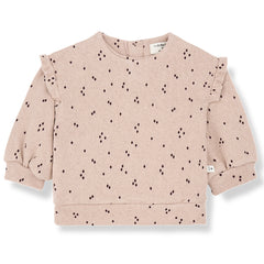 Line Sweater from 1+ in the Family. Soft nude baby sweatshirt with a subtle diamond print, ruffled shoulder details.