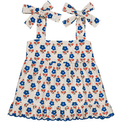 Hello Simone Lucie blouse, cream with blue and red floral print, tie straps and ruffled hem.