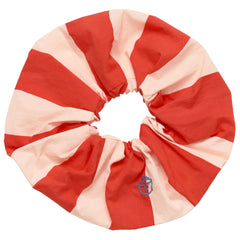 The Stripes Mangostan Scrunchy in red and white is a fun and stylish hair accessory featuring a striped pattern.