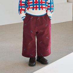 Momohanipopo Match EMB Pants in maroon featuring colorful matchstick embroidery, a wide-leg cut, and elastic waist.