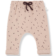 The Nora Pants from 1+ in the Family. Knit baby pants with an elastic waistband, and all-over geometric dot pattern.