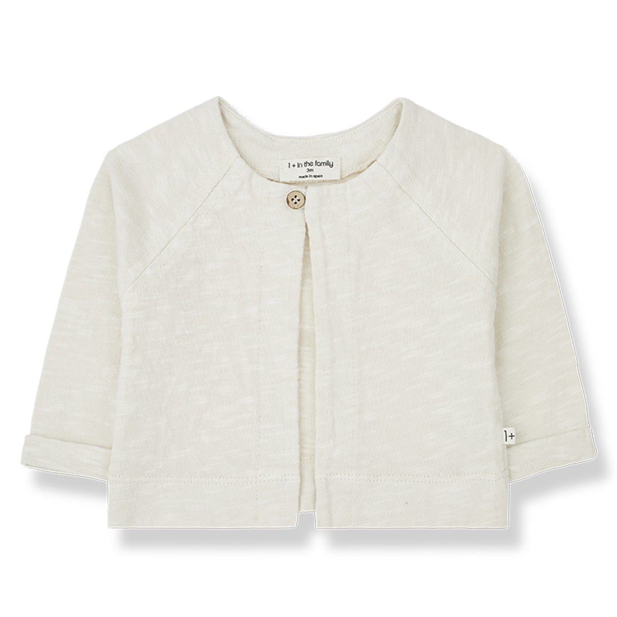 The Nuna Jacket from 1+ in the Family. Crew neck, Long sleeves, Raglan sleeve, Button(s) at the neck.