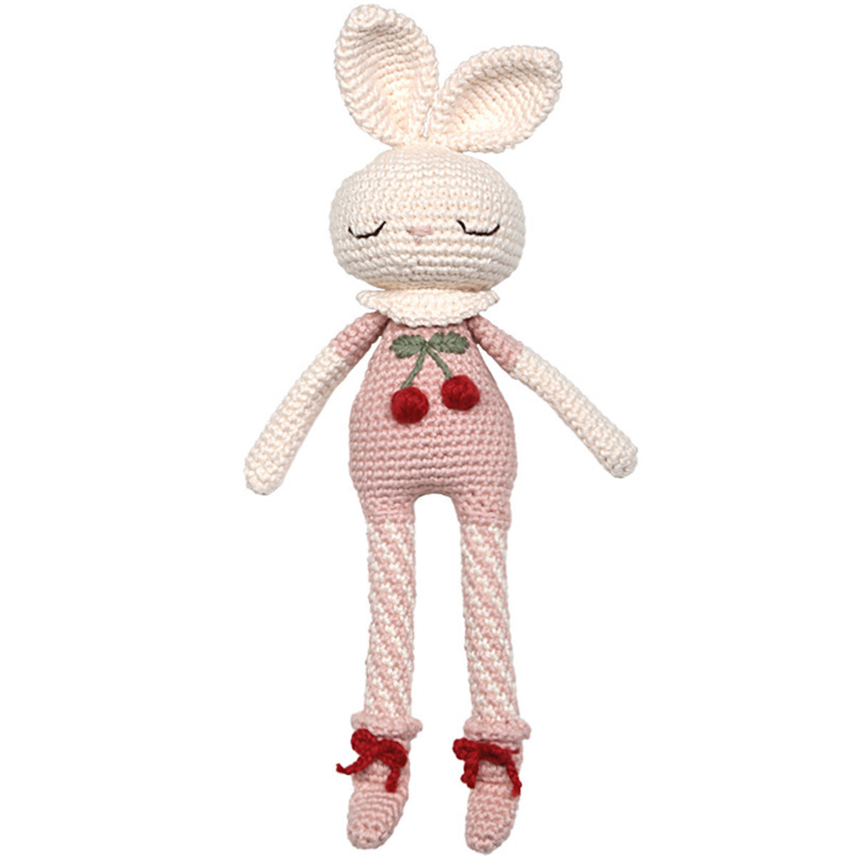 The Britney Bunny Cherry Blossom Doll from Patti Oslo. Crocheted toy rabbit with pink outfit and red accents on a white background.