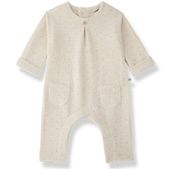 1+ in the Family The Pantin Jumpsuit in cream with dotted pattern and front pockets