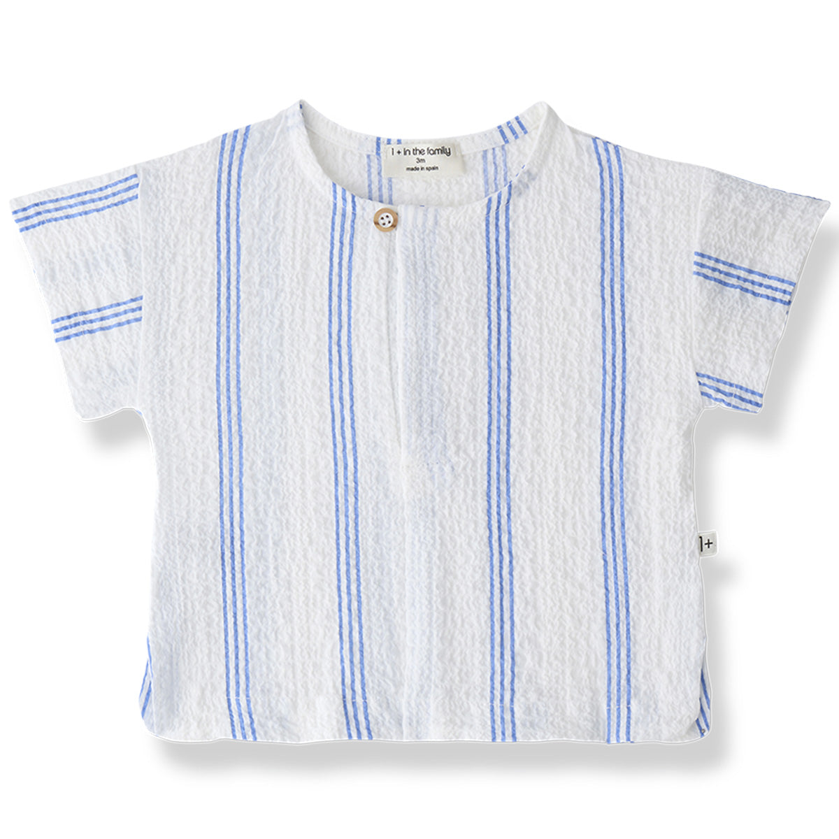 The Portlligat Shirt from 1+ in the Family with ultramarine vertical stripes, short sleeves, and a front button.