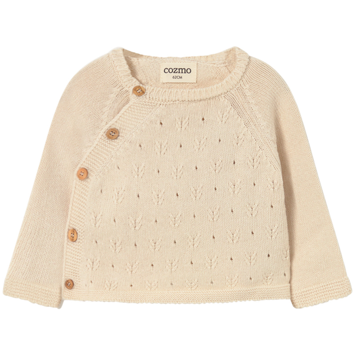 Cozmo Rain Top in cream knit with openwork pattern, long sleeves and asymmetrical wooden button closure.