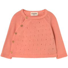 Cozmo Rain Top in cream knit with openwork pattern, long sleeves and asymmetrical wooden button closure.