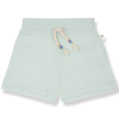 The Randa Bermuda from 1+ in the Family, soft baby shorts with an elastic waistband, drawstring, and a small back pocket.