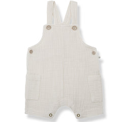 The Roman Overall from 1+ in the Family. Adorable and comfy off-white baby overalls made from soft, textured fabric. 