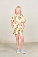 White Magazine Monkey Bermuda Shorts