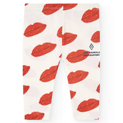 The White Kissing Penguin Leggings from The Animals Observatory. Baby leggings with a sun shield print.