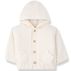 The Sefiros Padded Jacket from 1+ in the Family, a quilted baby jacket with a hood, front buttons, and two patch pockets.