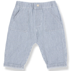 The Sineu Pants from 1+ in the Family in striped denim with elastic waistband, front button, patch pockets, and rolled cuffs.